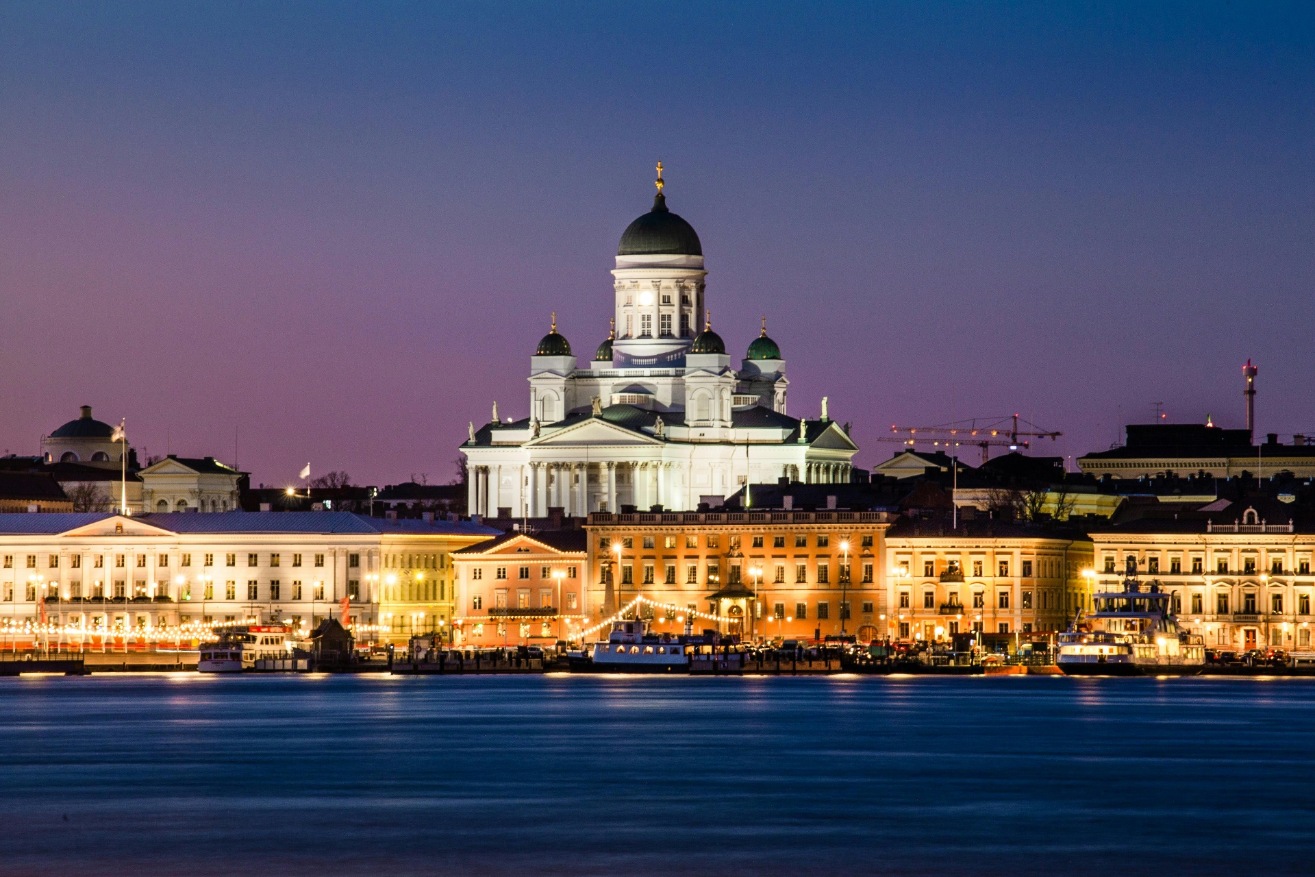 Helsinki waterfront skyline at twilight with historic architecture and harbor